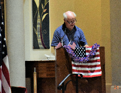 Past GK, Past DD, and District Warden Bob Hall reading during Patriotic Rosary